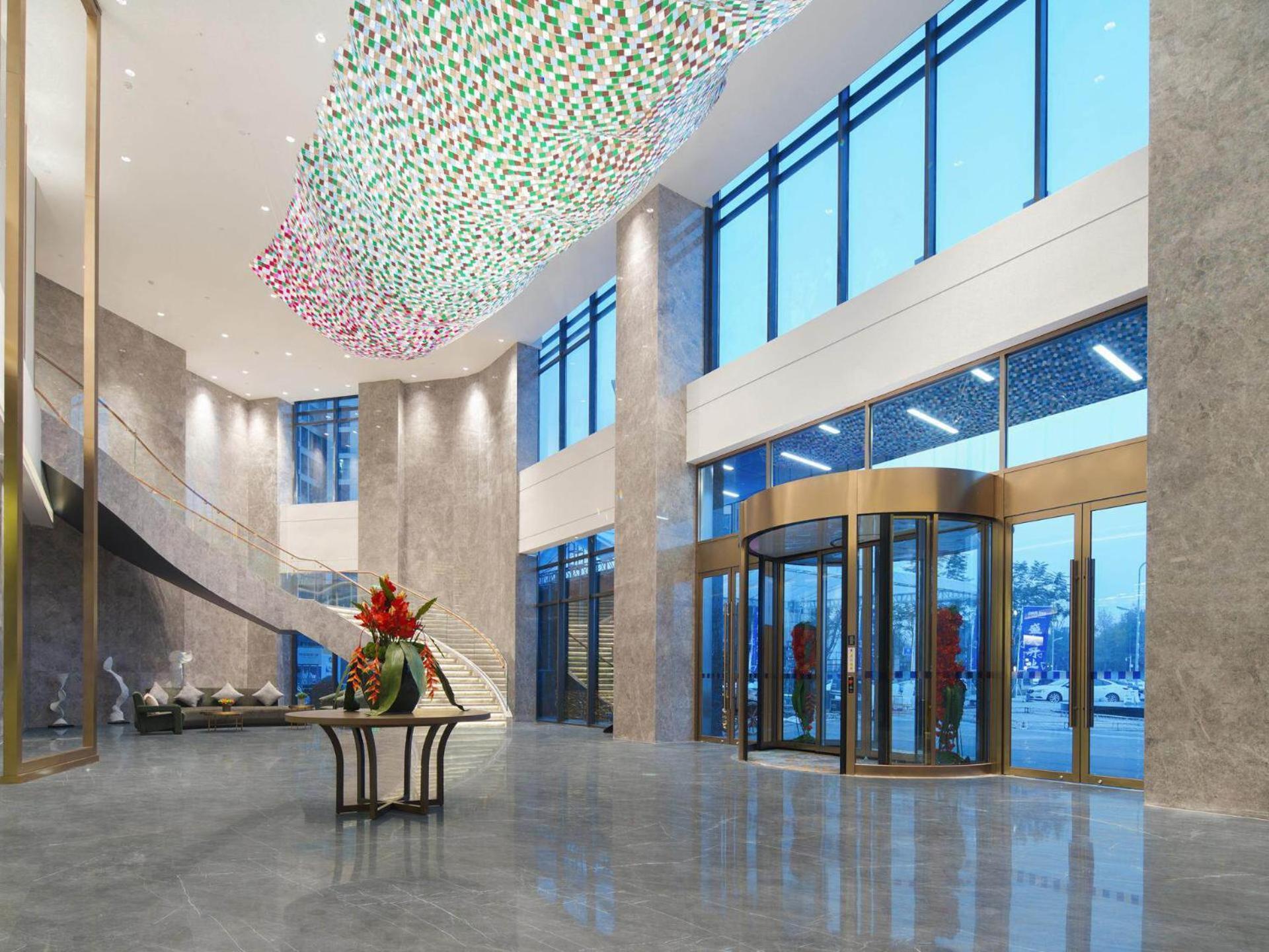Park Inn By Radisson Nanchong Yilong Star City Plaza Exterior photo