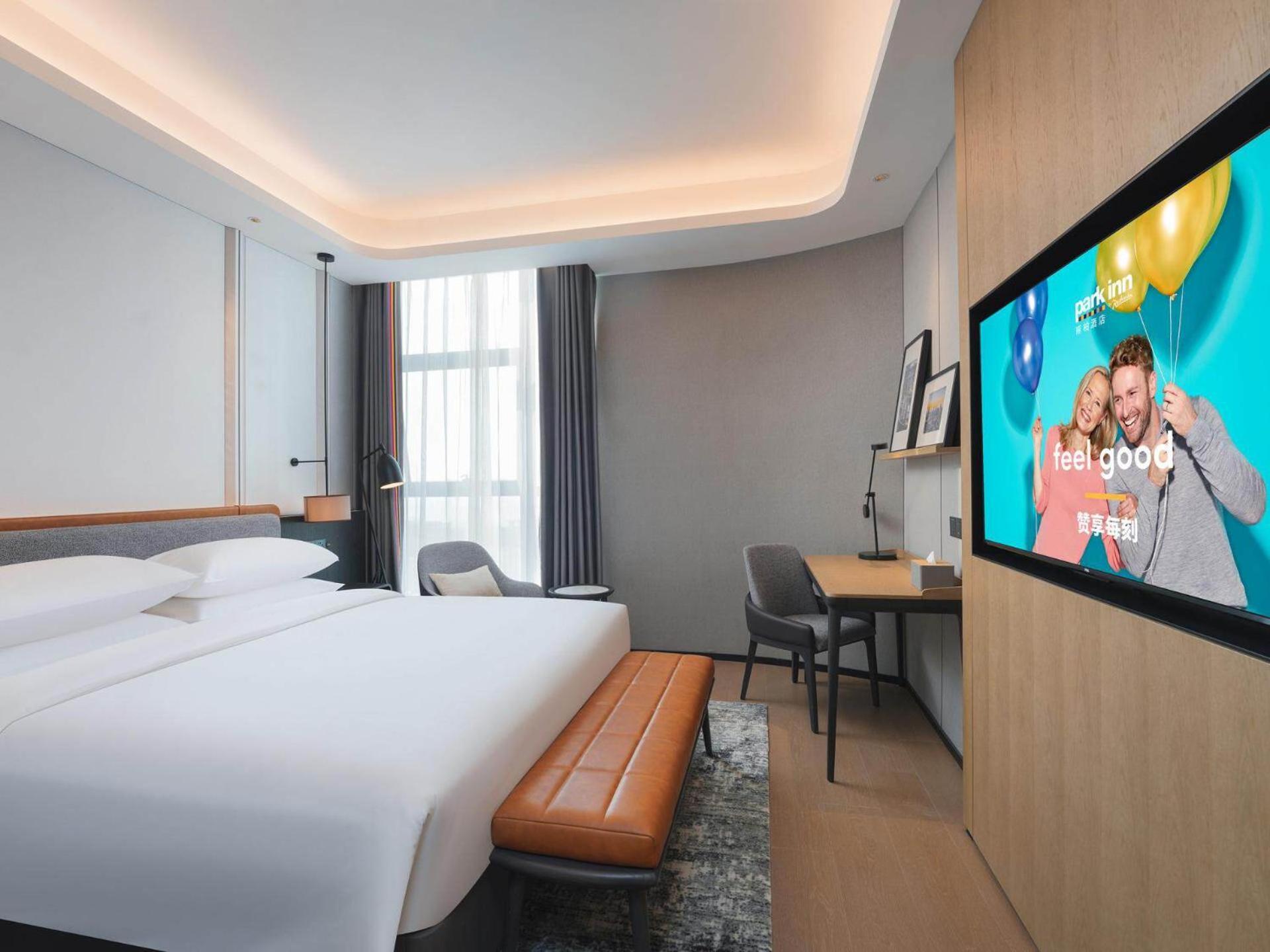 Park Inn By Radisson Nanchong Yilong Star City Plaza Exterior photo