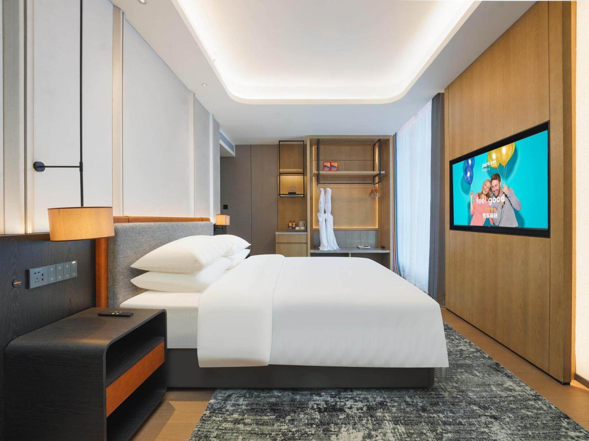 Park Inn By Radisson Nanchong Yilong Star City Plaza Exterior photo