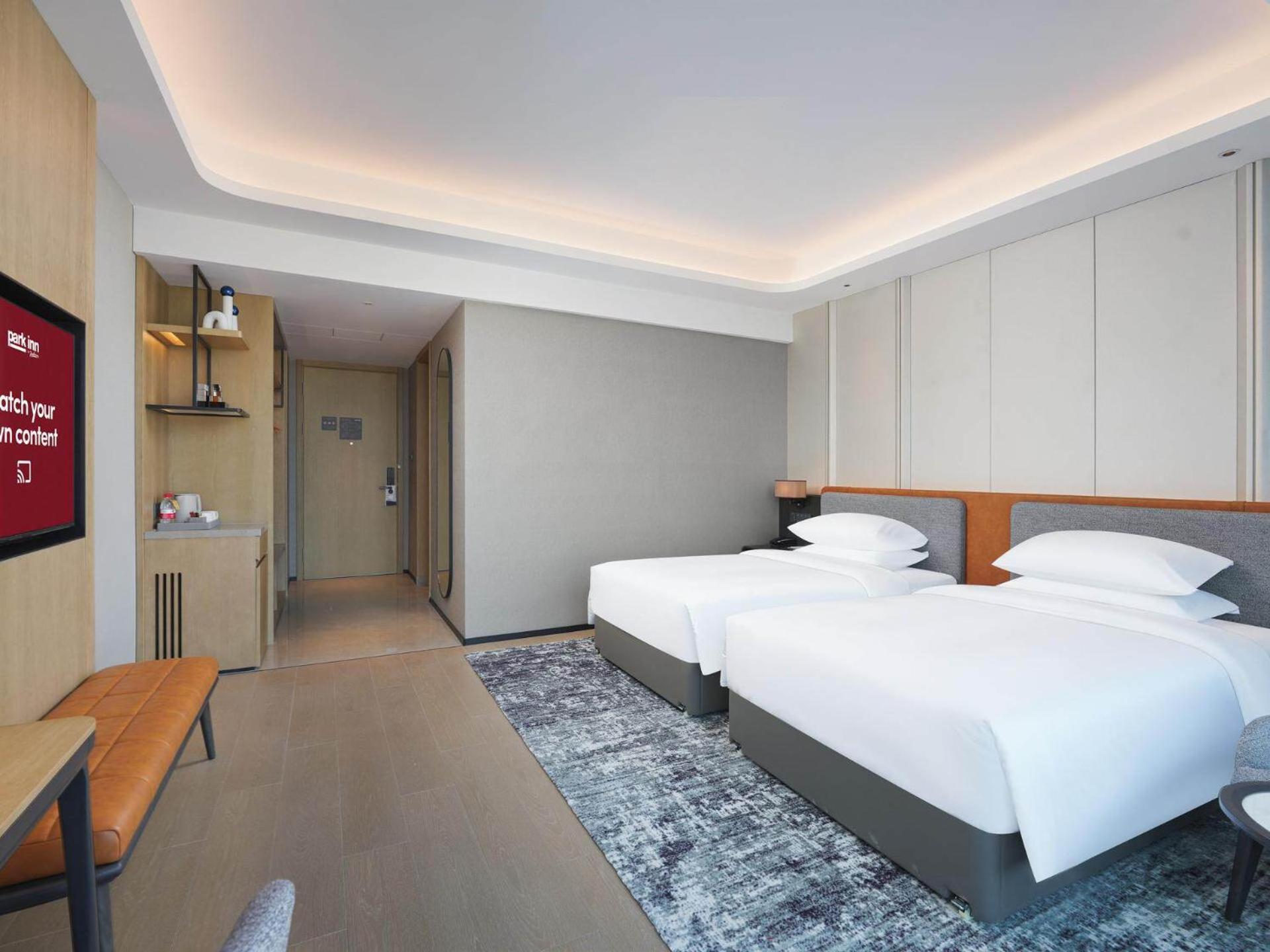 Park Inn By Radisson Nanchong Yilong Star City Plaza Exterior photo