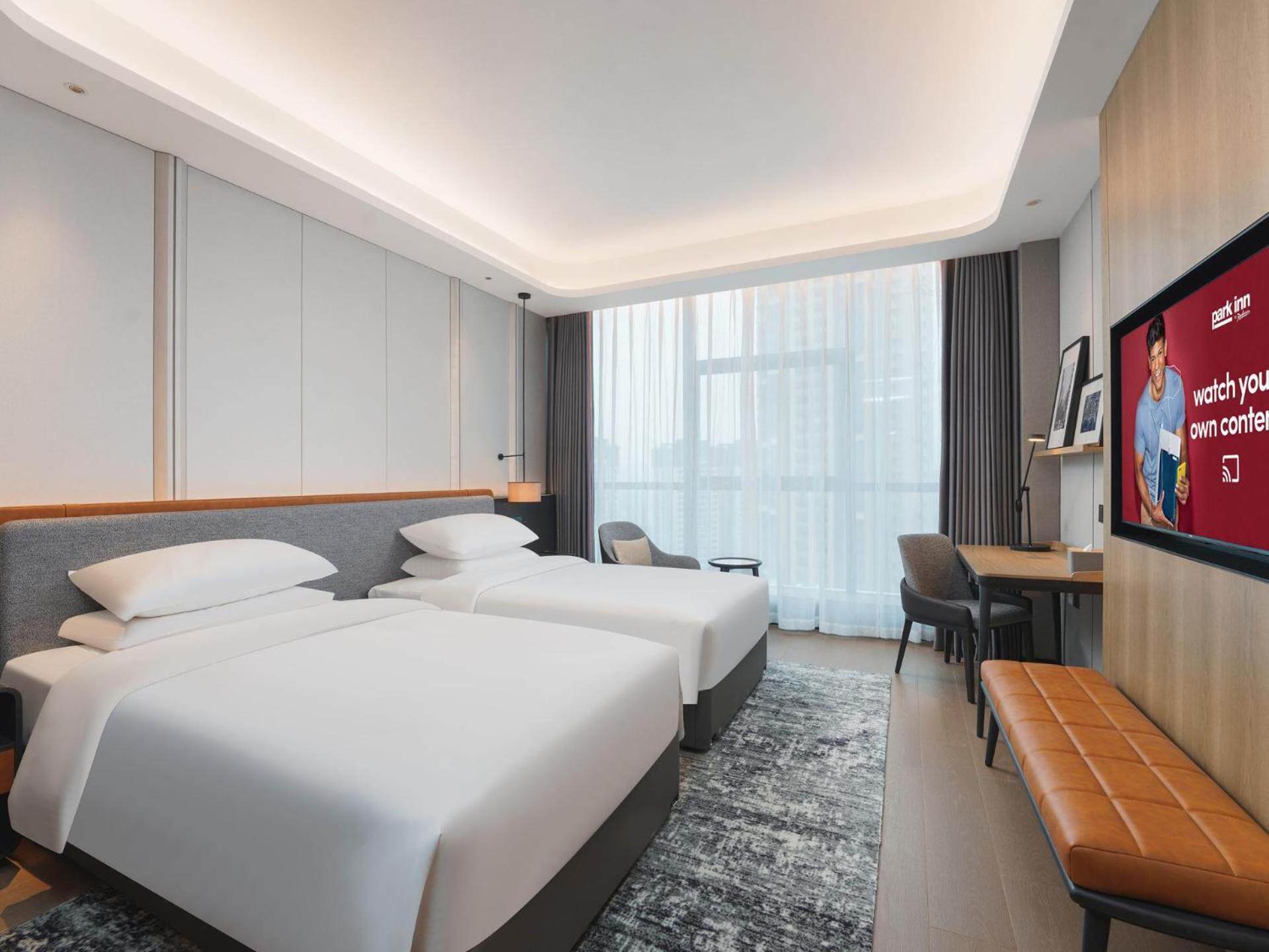 Park Inn By Radisson Nanchong Yilong Star City Plaza Exterior photo