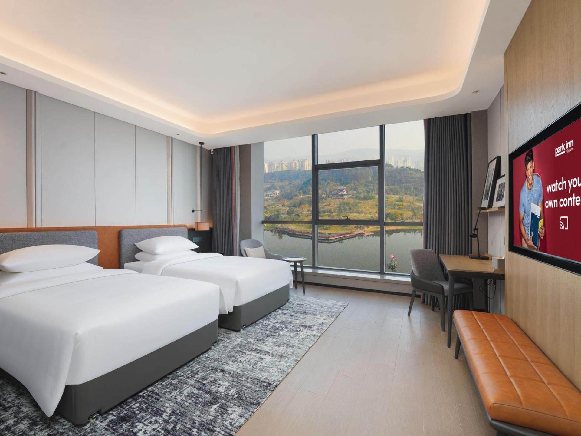 Park Inn By Radisson Nanchong Yilong Star City Plaza Exterior photo