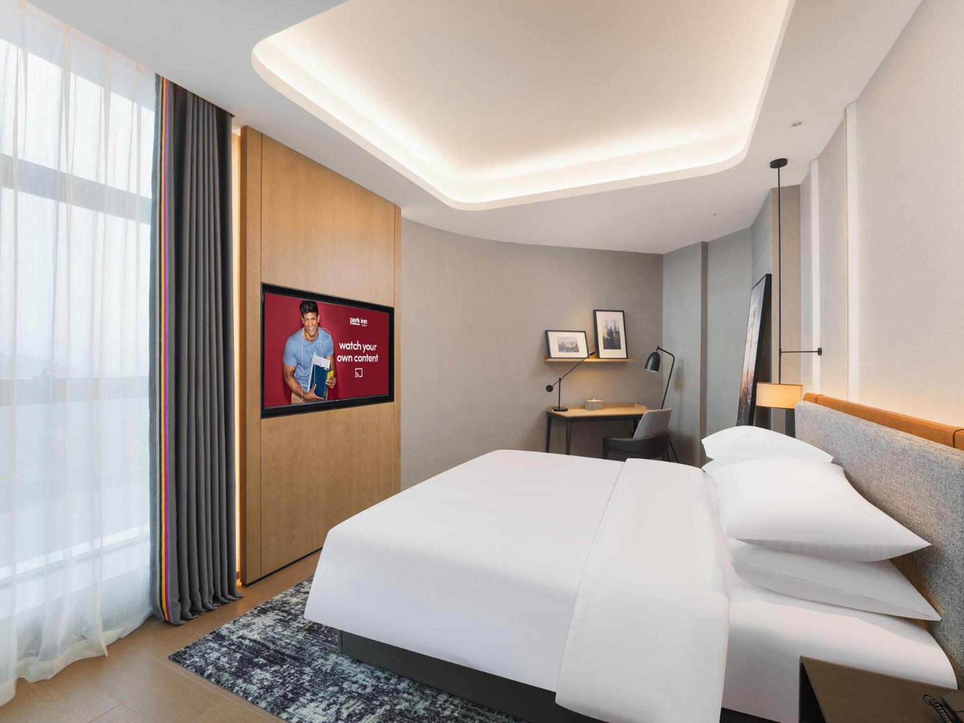 Park Inn By Radisson Nanchong Yilong Star City Plaza Exterior photo