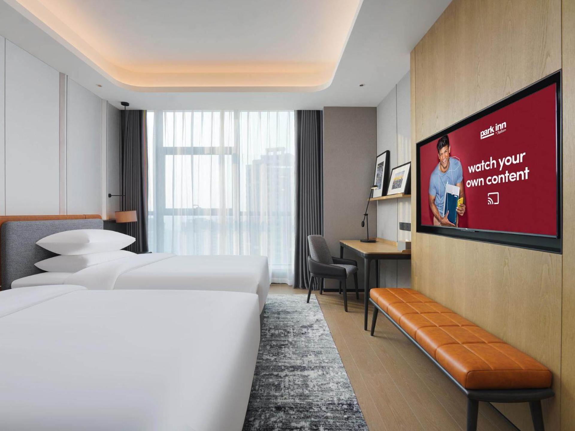 Park Inn By Radisson Nanchong Yilong Star City Plaza Exterior photo